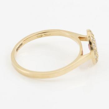 Ring, carved, 14K gold with pink sapphire and brilliant-cut diamonds.