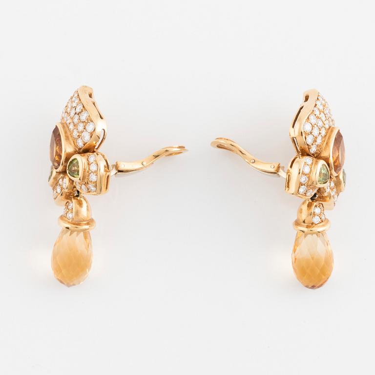 A pair of 18K gold earrings with briolette- and faceted-cut citrine and peridot.