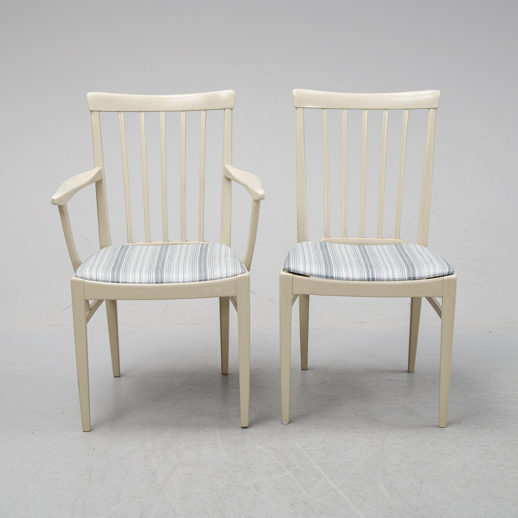 A dining table with two armchairs and six chairs by Carl Malmsten for Bodafors.