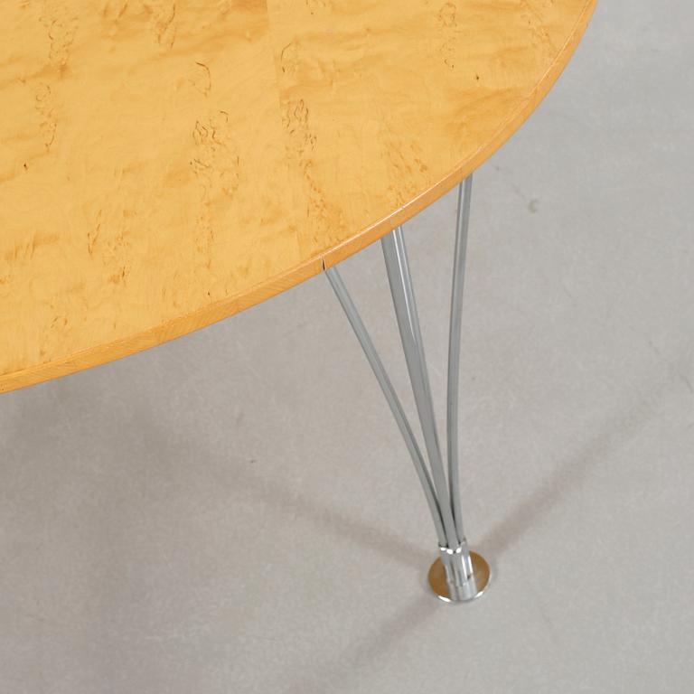 A coffee table named "Supercirkel", designed by Piet Hein and Bruno Mathsson.