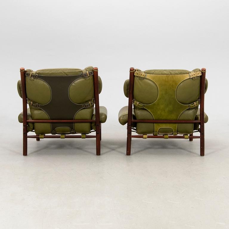 Arne Norell, a pair of armchairs and a footstool "Inca", Norell Möbel AB, second half of the 20th century.