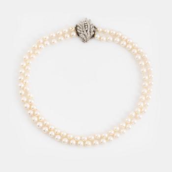 Two strand cultured pearl necklace, clasp with diamonds.