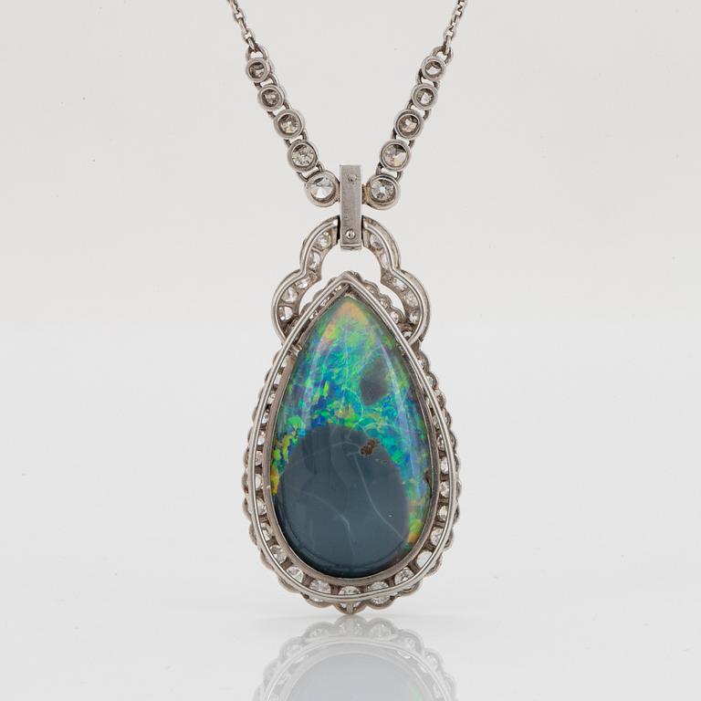 A platinum and black opal necklace set with old- and eight-cut diamonds.