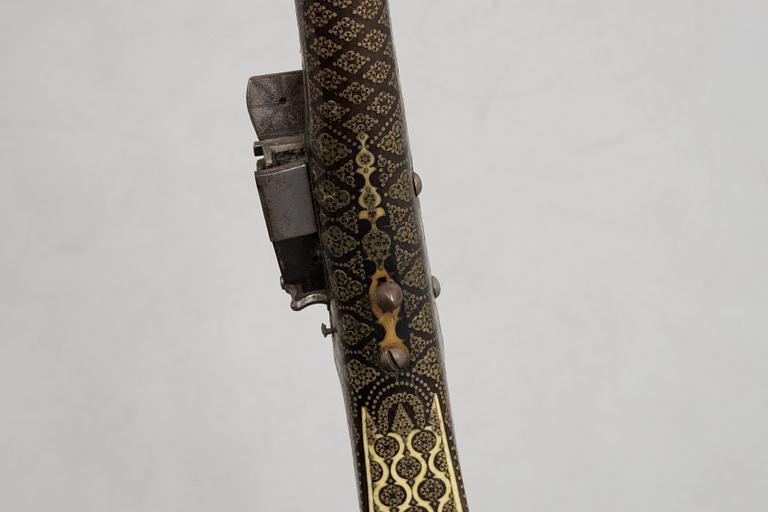 A Persian snaphaunce rifle, 18th century.