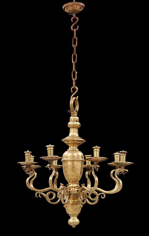 A 19th century eight-light brass chandelier in the manner of Hans Rogiers van Harelbeke.
