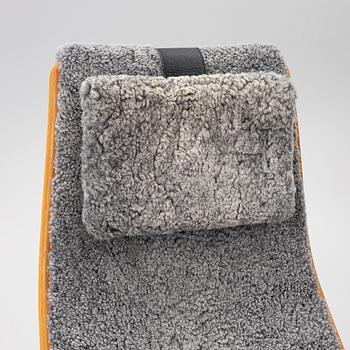 Yngve Ekström, a 'Lamino' armchair with ottoman, Swedese, Sweden, 2018.