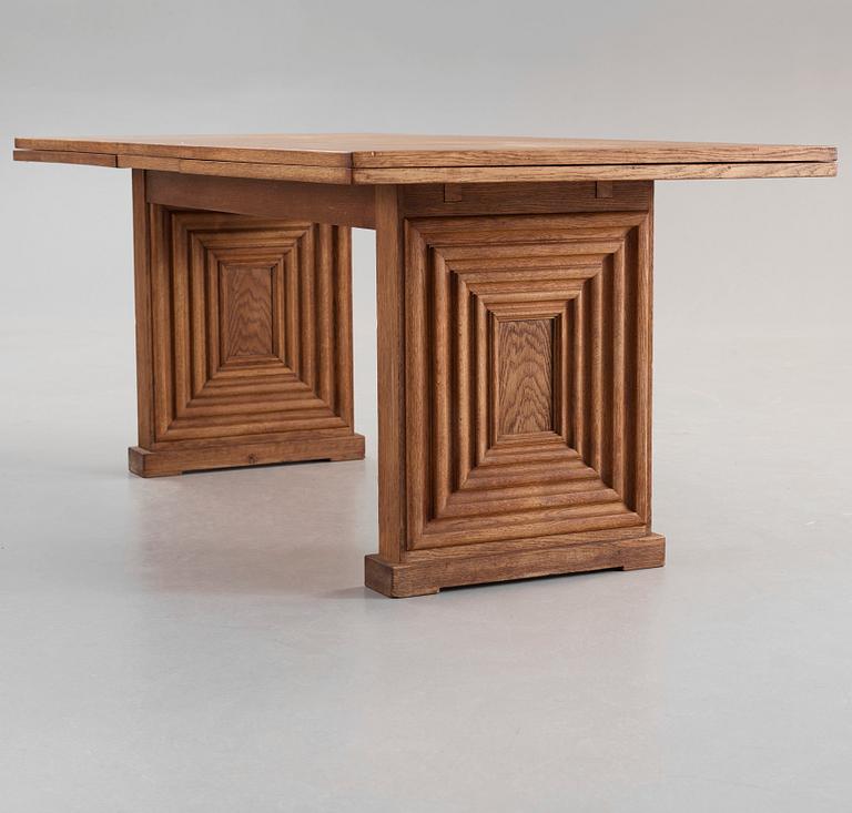 A Swedish Modern oak dining table, attributed to Oscar Nilsson, probably executed by cabinetmaker J Wickman, Stockholm,