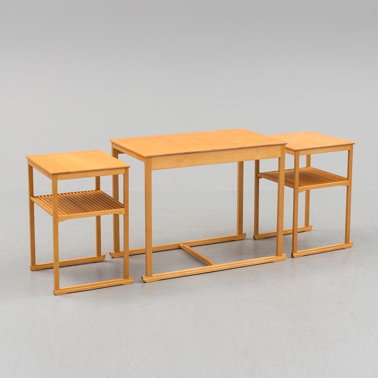A Swedish Carl Malmsten "The Sled" birch side table nesting table i three parts, Åfors Möbelfabrik.