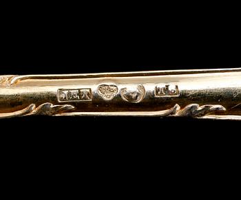 KAFFESKEDAR, 12 st, förgyllt silver, 1897. Vikt ca 159 g.