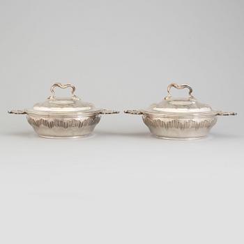 TUREENS, a pair, sterling, silver. Louis XV-style. French export marks after 1879.