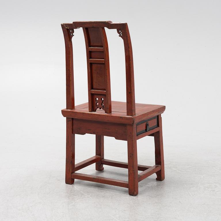 A red-lacquered chair, China, Qingdyansty, late 19th century.