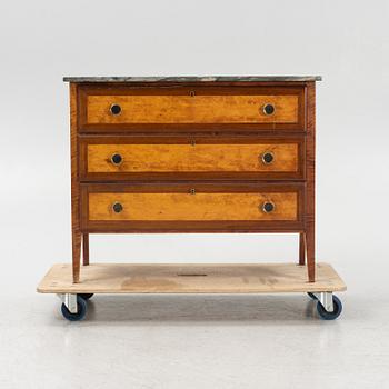 A mahogany and birch veneered dresser with a stone top.