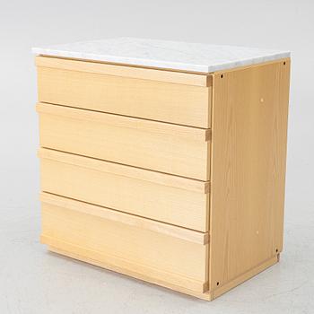 A contemporary chest of drawers.