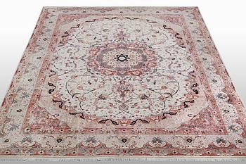 A carpet, Tabriz, part silk, 50 Raj, ca 340 x 253 cm.