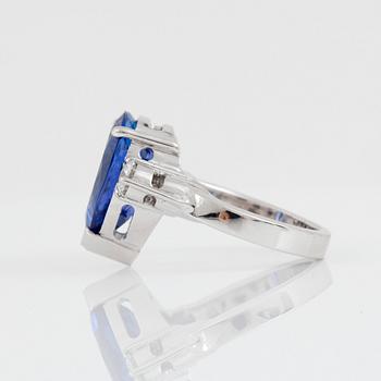 A pear-shaped tanzanite and brilliant-cut diamond ring. Total carat weight of diamonds 0.40 ct.