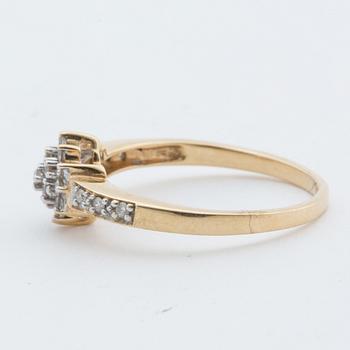 A 18K gold ring with diamonds,