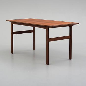 A second half of the 20th century teak vaneered coffee table.