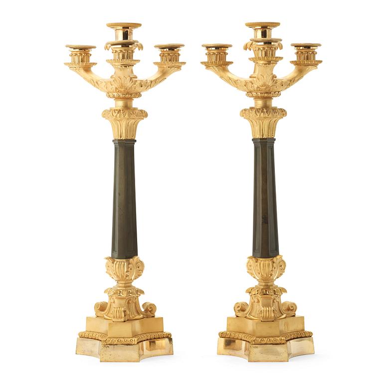 A pair of four-light candelabra, Empire.