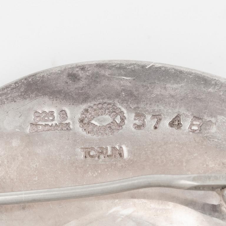 Vivianna Torun Bülow-Hübe,  silver "Möbius",earrings and brooch, Georg Jensen.