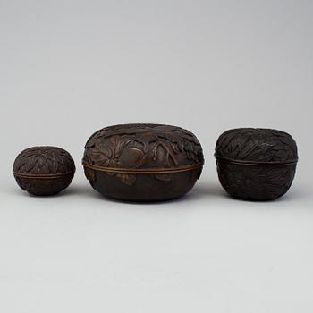 Three Japanese wooden boxes with covers, early 20th Century.