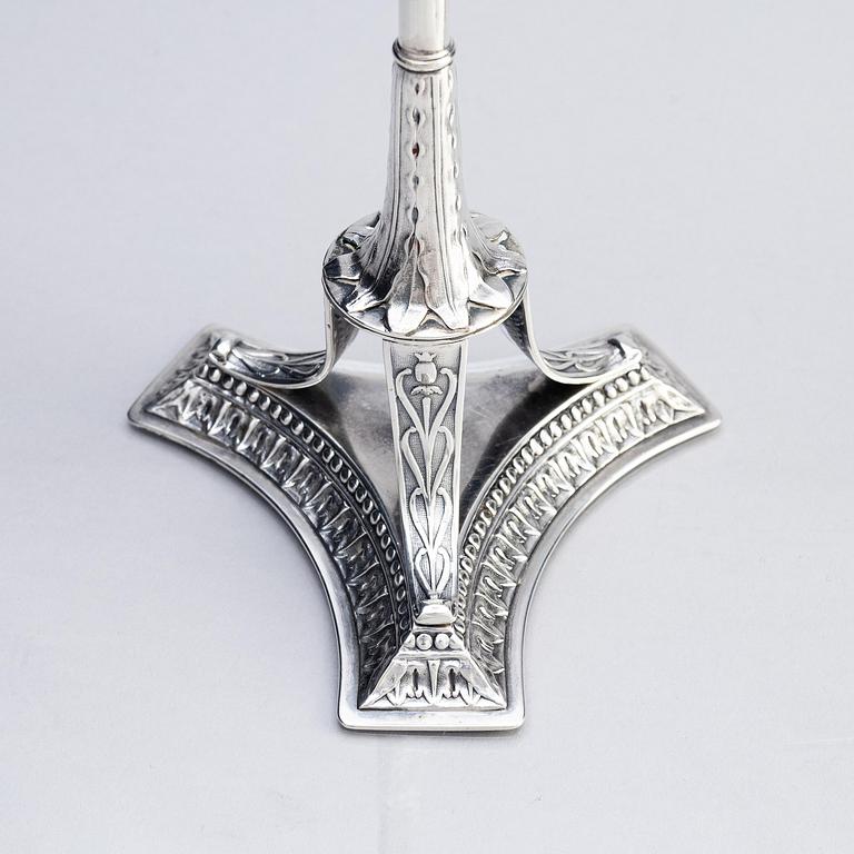 A pair of Swedish early 19th century silver candlesticks, marks of Adolf Zethelius, Stockholm 1817.