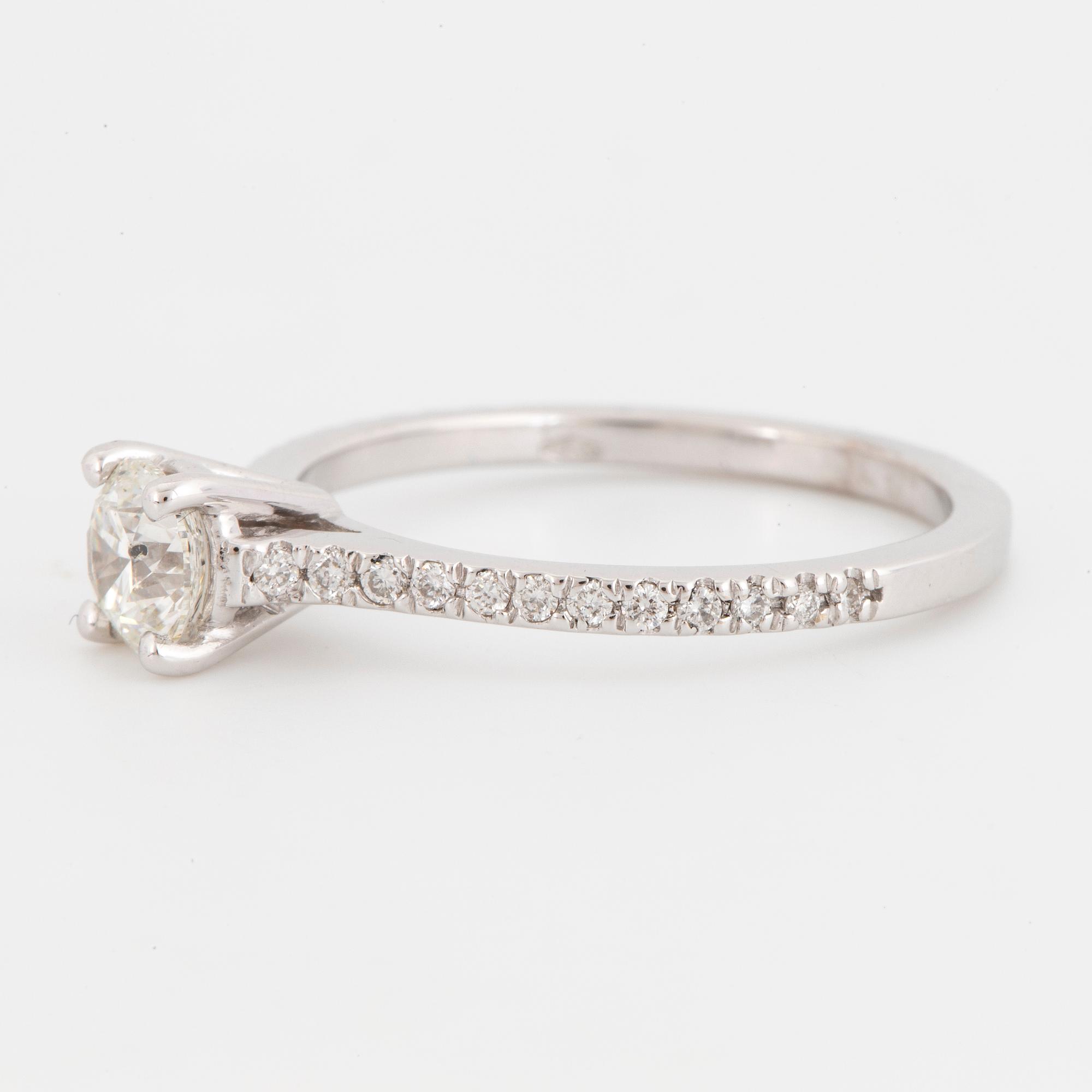 0,57 ct brilliant-cut diamond ring.
