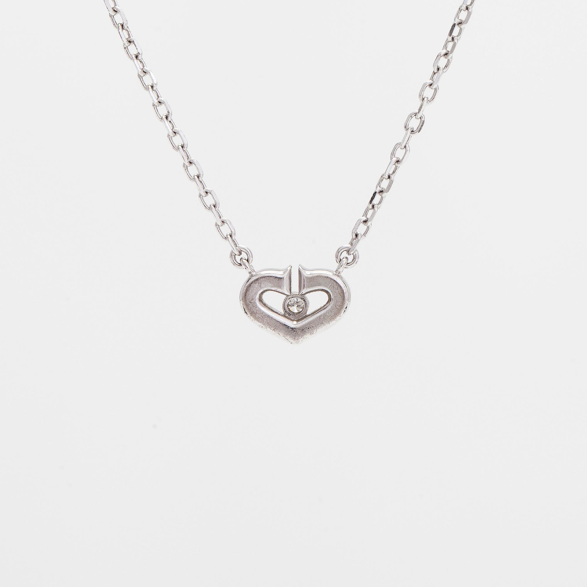 Cartier, an 18K white gold 'C Heart of Cartier' necklace with diamonds approx. 0.09 ct in total.