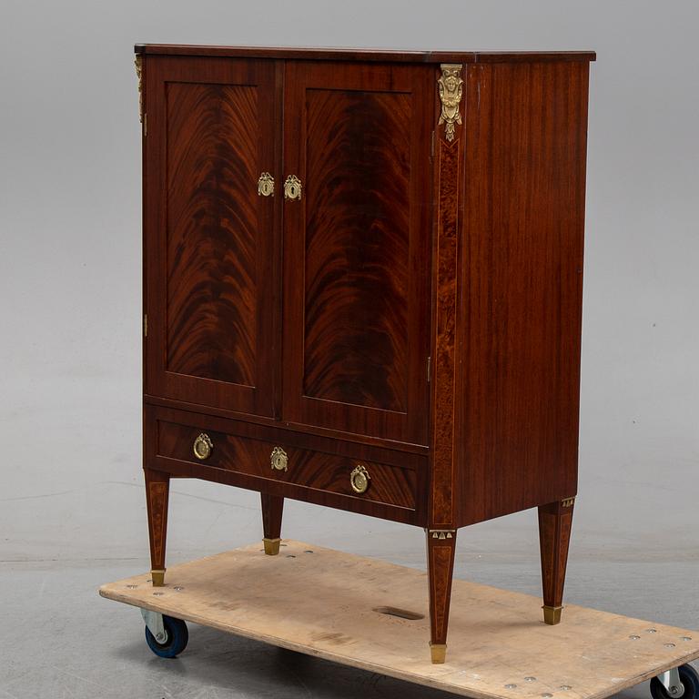 A mid 20th Century Gustavian style mahogany cabinet.