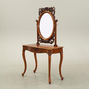 A rococo style dressing table, 19th Century.