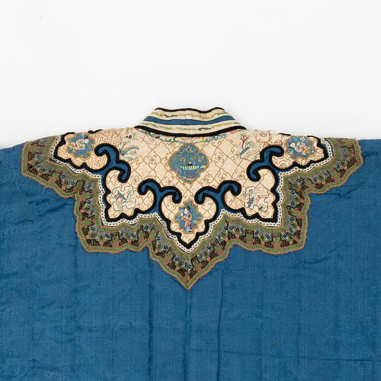 An embroidered and winter padded Chinese silk jacket, Qing dynasty, 19th century.