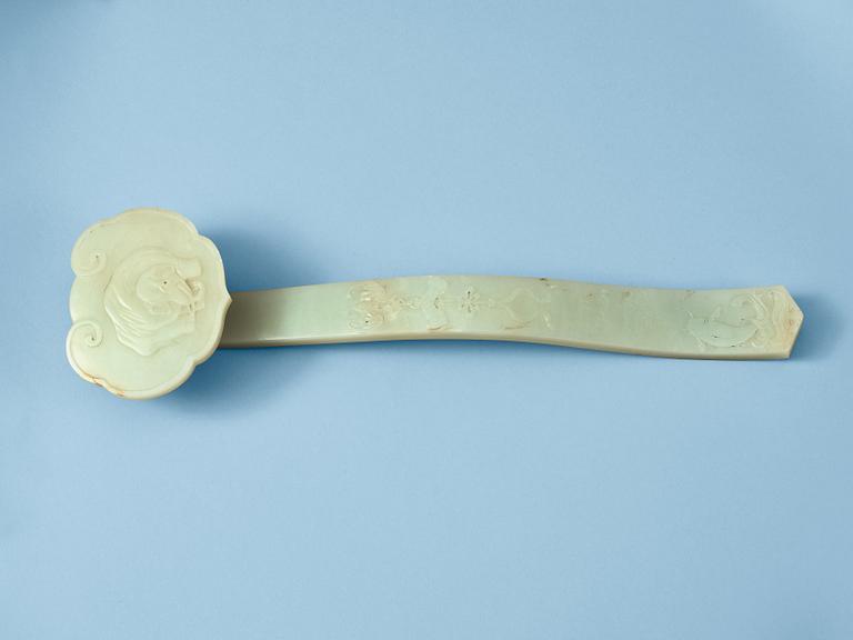 A nephrite ruyi scepter, early 20th Century.