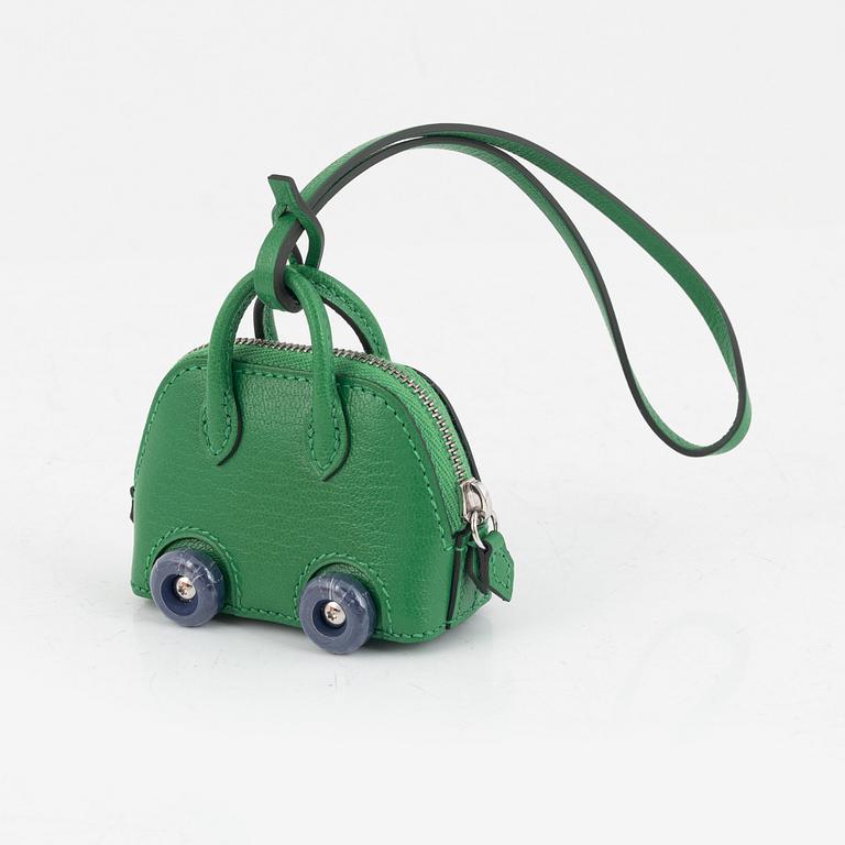 Hermès, "Bolide on wheels bag charm", 2023.