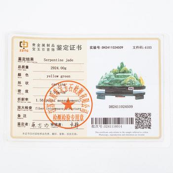 A serpentine jade csulptural carving, China, modern manufacturing.