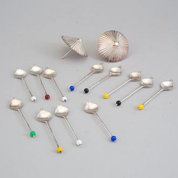 A set of 14 silver drink accessories.