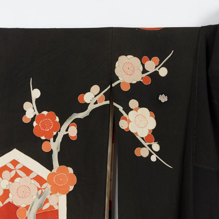 A painted and embroidered silk kimono. Japan, 20th century.