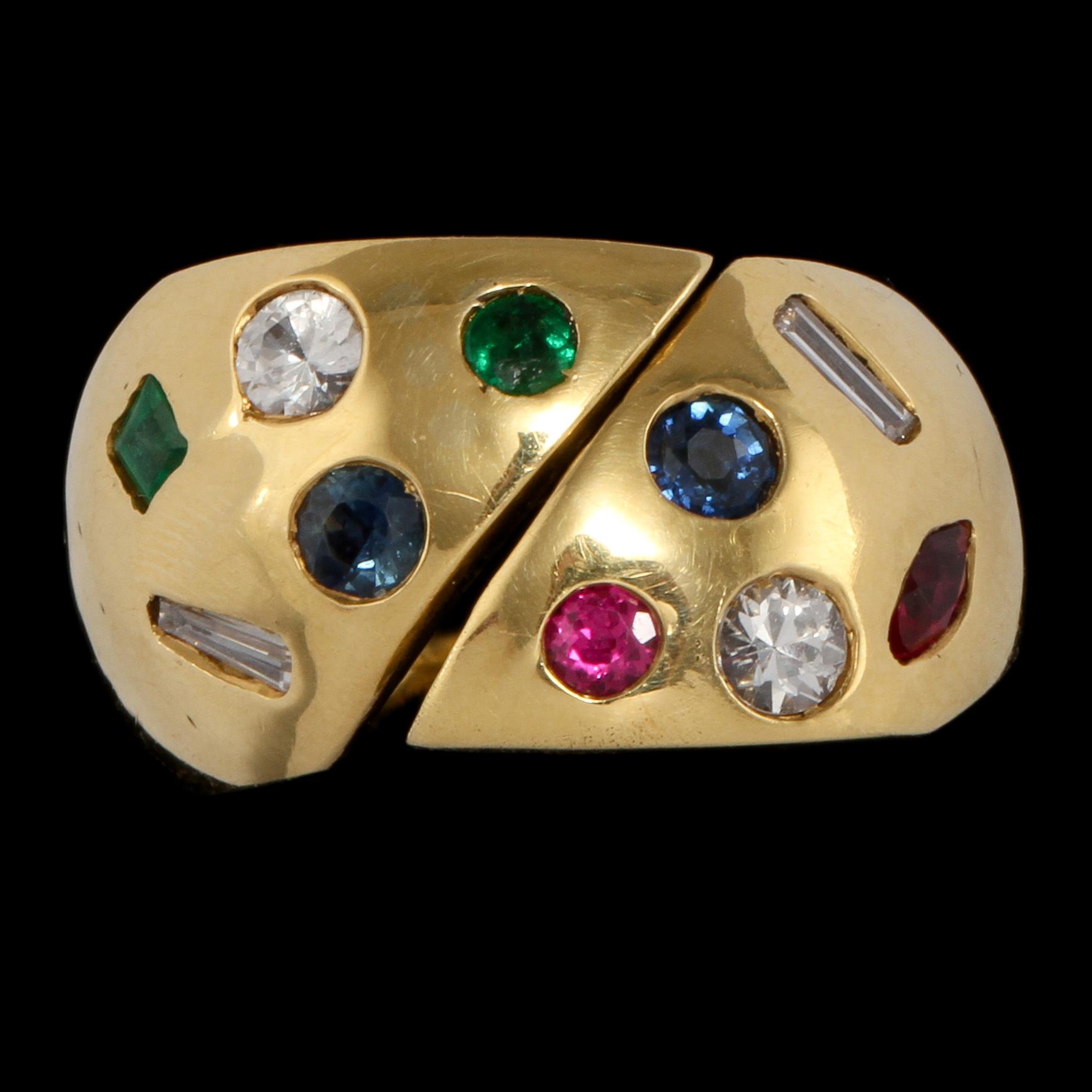 RING, 18k guld med fasettslipade rubiner, blå safirer och smaragder samt baguett och briljantslipade diamanter. Vikt 8 g.