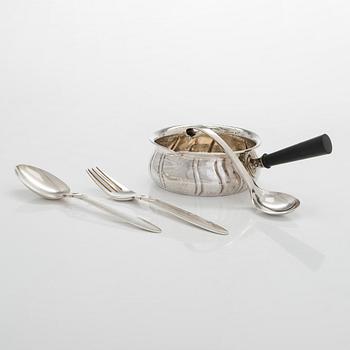 A spoon and fork by George Jensen, a jam spoon by Holm, and a serving dish, silver, Copenhagen circa 1930-33.