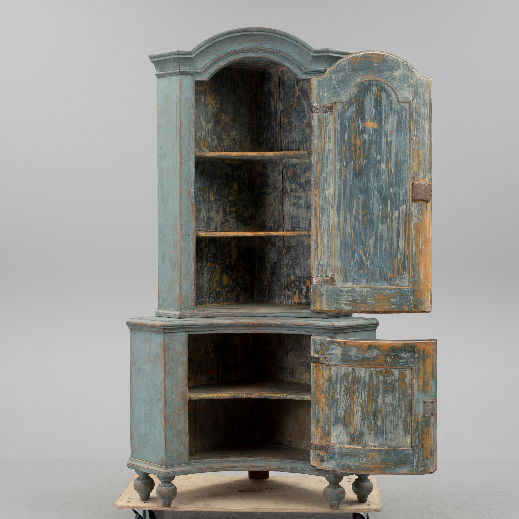 A 18th century corner cabinet.
