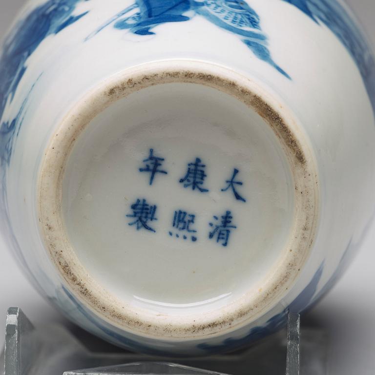 A blue and white vase, late Qing dynasty with Kangxi mark.