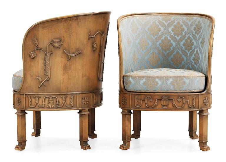 A pair of Axel Einar Hjorth stained birch armchairs 'Caesar' by NK 1928.