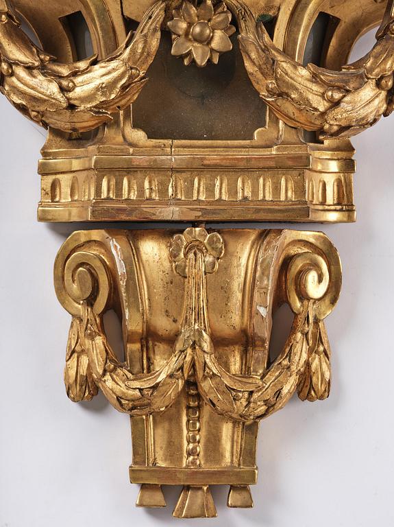 A Gustavian giltwood cartel clock by O. Ljundahl (watchmaker in Stockholm 1775-80).