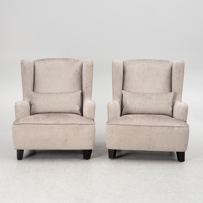 A pair of easy chairs, 21st century.