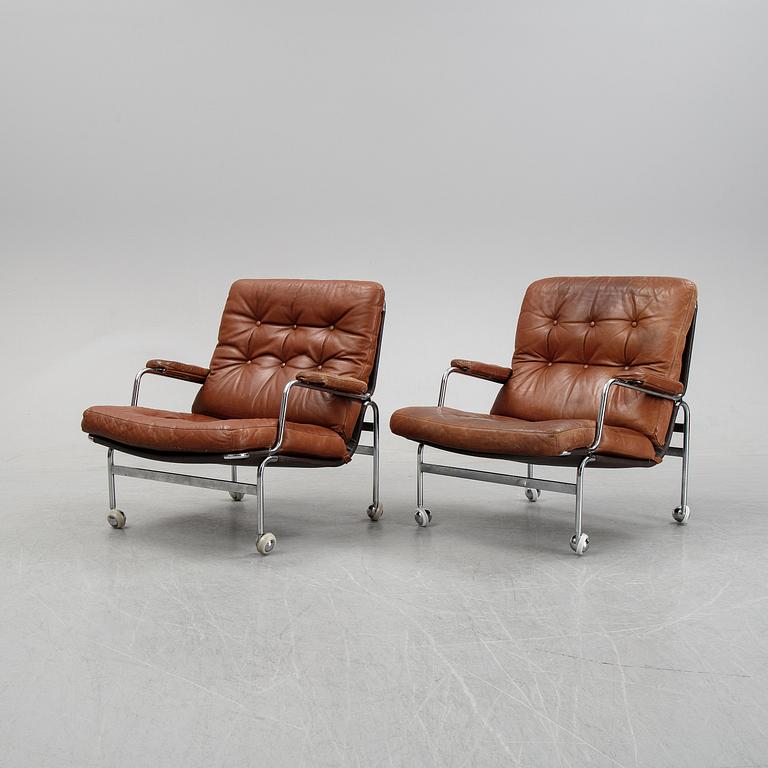 A pair of 'Karin' easy chairs by Bruno Mathsson for Dux, designed 1969.