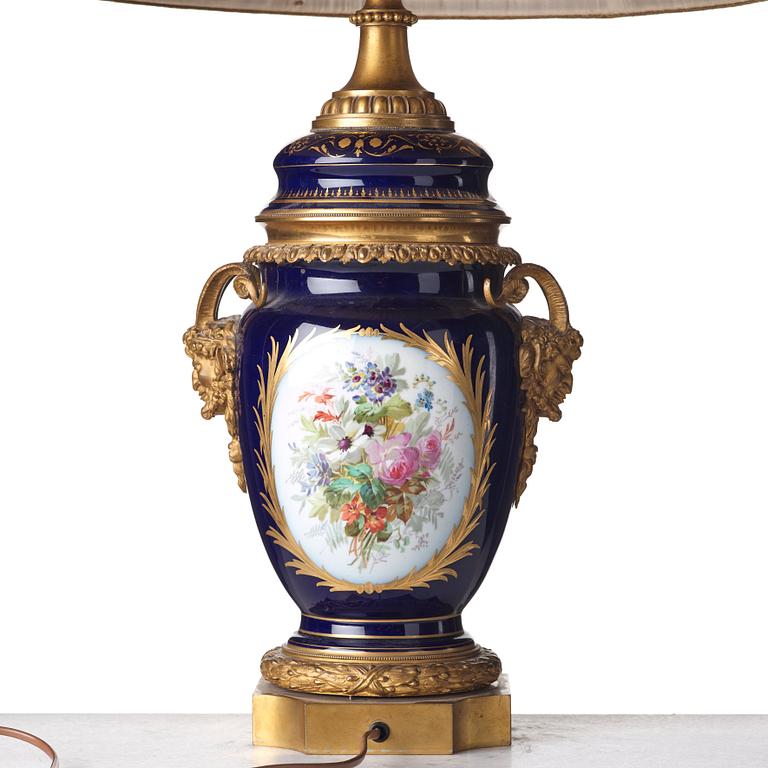 A French bronze mounted porcelain table lamp, late 19th Century, signed Thuilier.