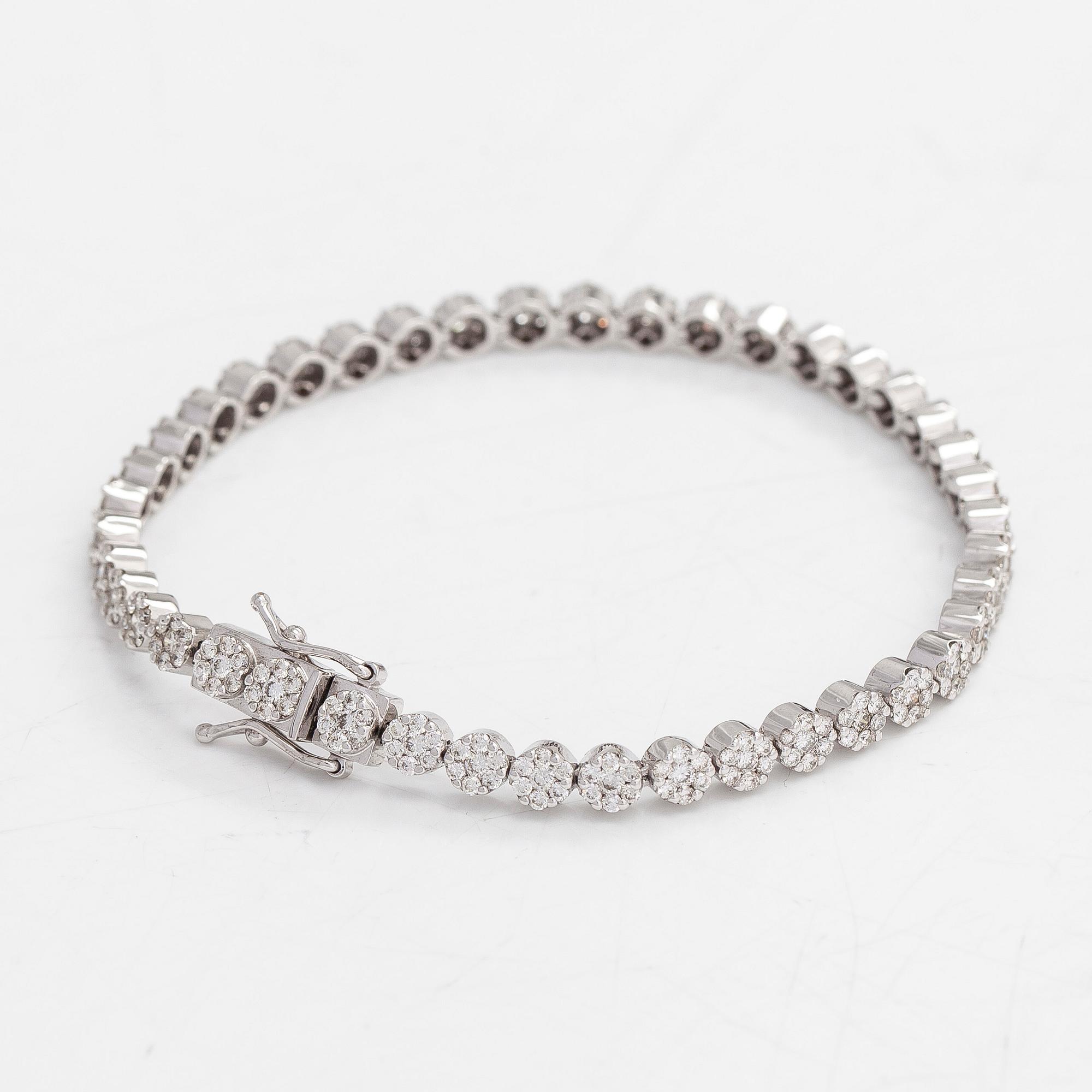 Tennisrannekoru, 18K valkokultaa, timantteja yht noin 3.44 ct. Suomalaiset leimat.