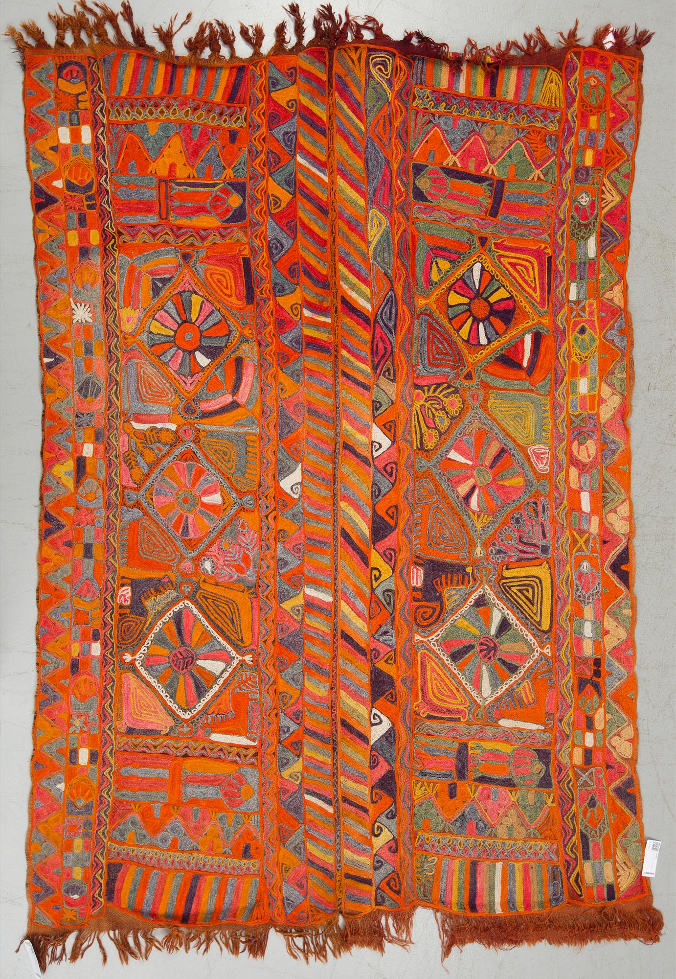 A semi-antique embroidered textile by the Marsh Arabs/nomads in Iraq, around 207 x 163 cm.