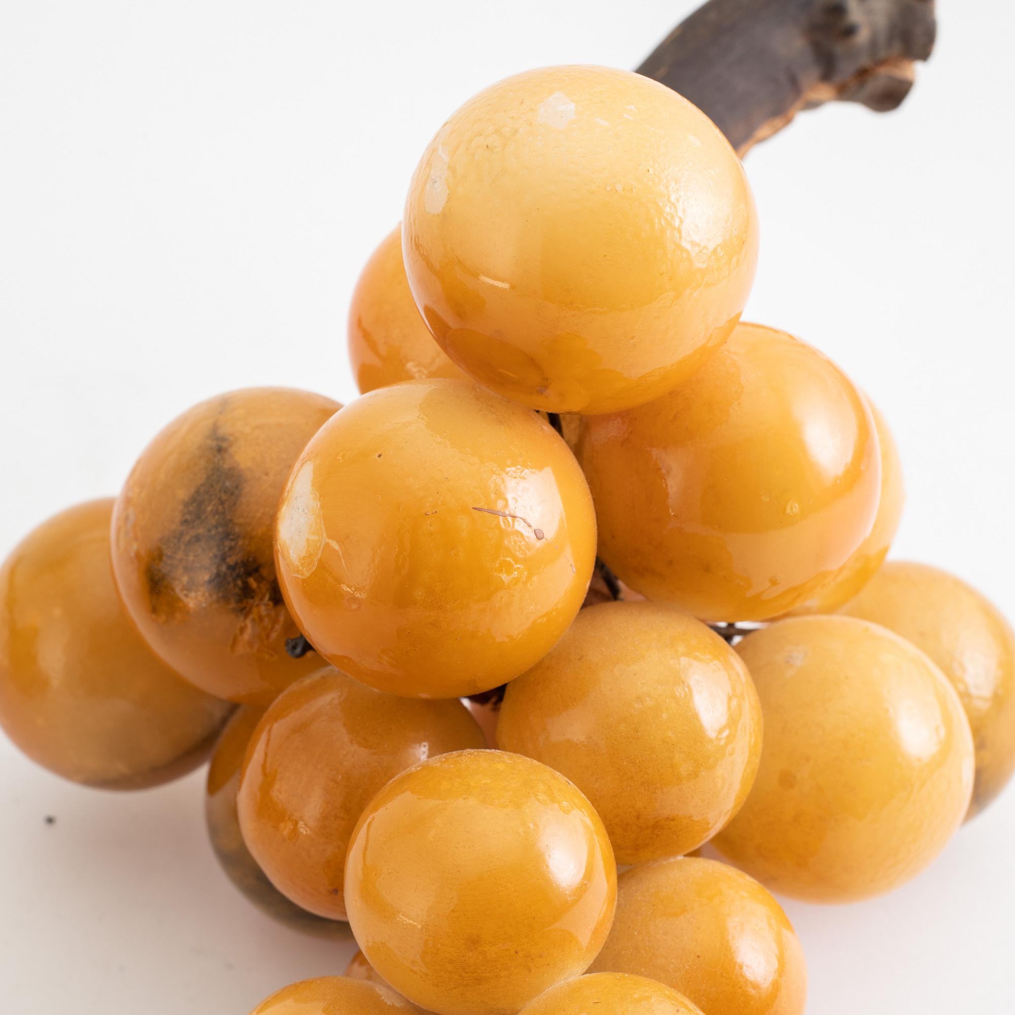 A pair of wooden and alabaster table decorative objects in the shape of grape vines, mid 20th Century.