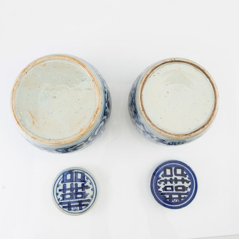 A set of two Chinese blue and white jars with covers, 20th century.