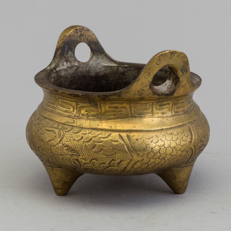 A Chinese early 20th century gilt-bronze censer, with Xuandes six character mark to the base.