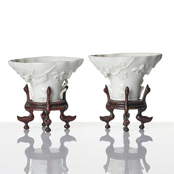 Two blanc de chine rhinoceros libation cups, Qing dynasty, Kangxi (1662-1722).
